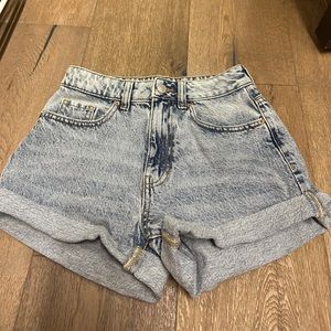 These dark wash jean shorts are a size 23 and very comfortable